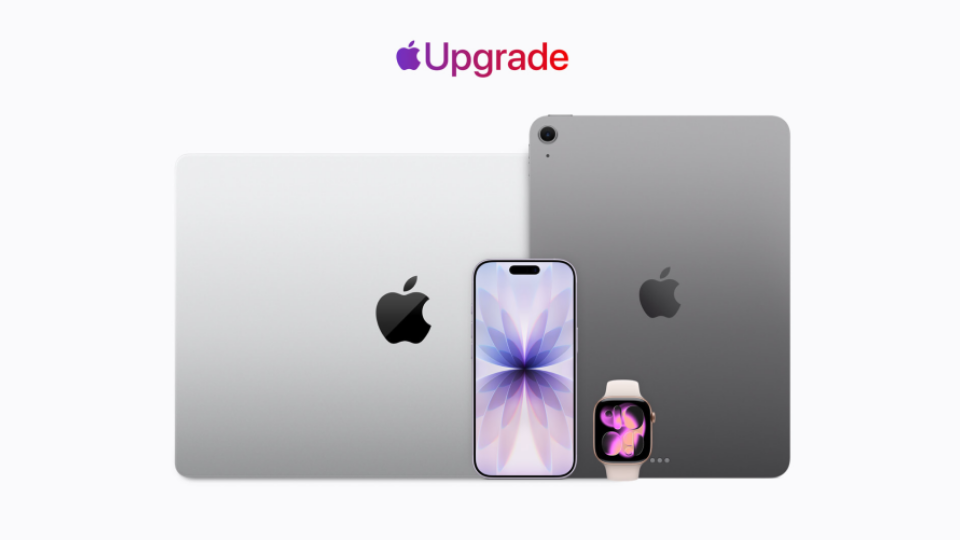 An Apple laptop, iPad, iPhone, and Apple Watch displayed together on a white surface.